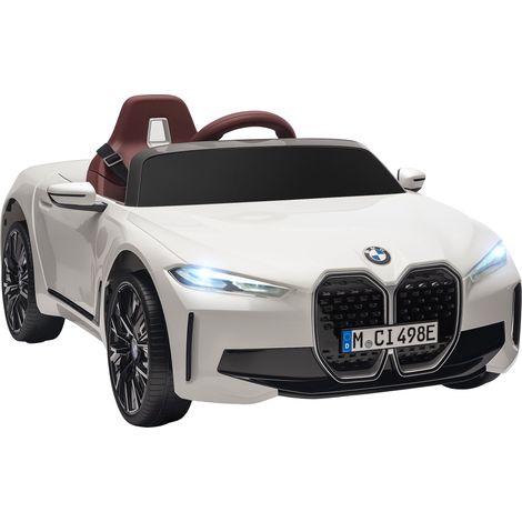 Auto elettrica per bambini BMW i4 12V con licenza ufficiale, telecomando, lettore MP3, musica, luci e cintura di sicurezza, 115x67x45 cm, nera.