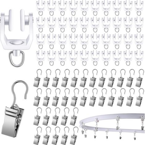 Es sind zwei Sets Gardinenhaken und -clips sowie 20 gebogene Gardinenschienenrollen und -räder erhältlich. (1/5)