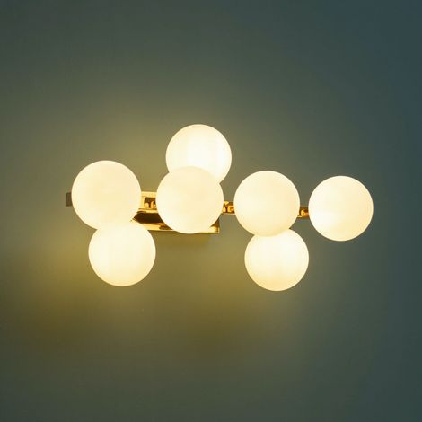 Kosilum – Applique murale dorée 52,5 cm avec 7 abat-jours en verre blanc opal – Ampoules G9 – Éclairage moderne pour salon et entrée