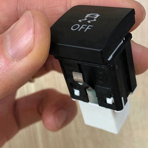 Disponible en deux couleurs : noir et blanc. Matière : plastique. Convient aux boutons de commande du programme de stabilité électronique automobile. (1/5)