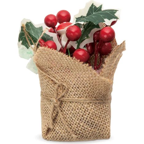 Adorno navideño de acebo en una bolsa de yute