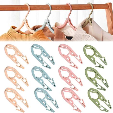Grucce da viaggio, grucce pieghevoli, 12 grucce pieghevoli portatili in plastica con 24 clip, adatte per famiglia, viaggi, campeggio, vacanze e hotel (4 colori).