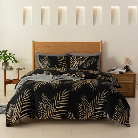 Copripiumino 140 x 200 cm – 2 pezzi – microfibra – fantasia palme tropicali oro e nero – letto singolo con federa (1/5)