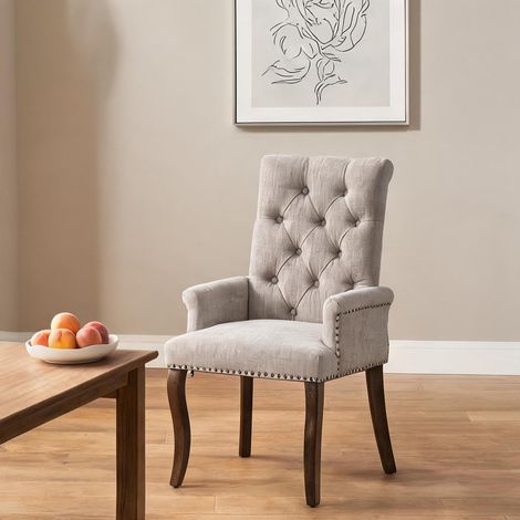 Fauteuil de salle à manger en tissu beige avec dossier capitonné (1/5)