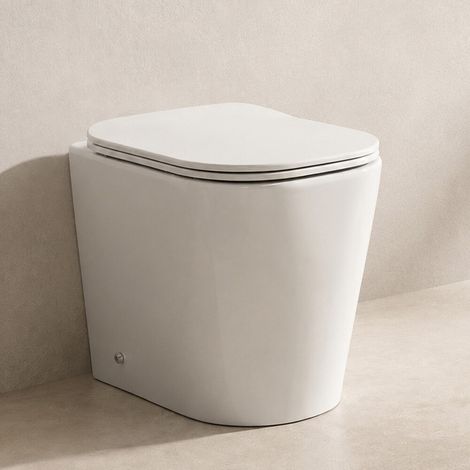Wc filo muro profondità 48cm con scarico a terra tornado e sedile soft close Atami (1/5)