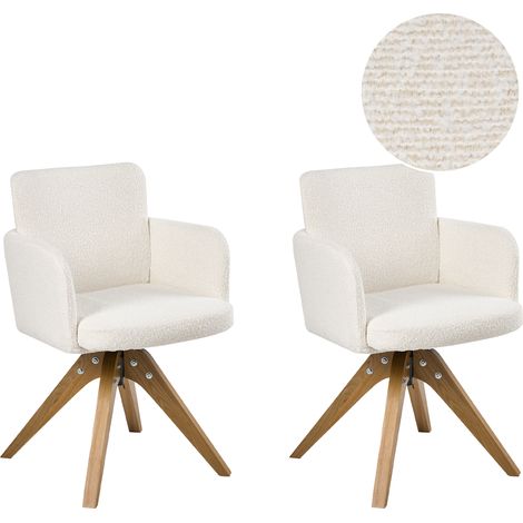 Conjunto de 2 sillas de comedor base giratoria con reposabrazos tapizado de bouclé patas de madera blanco crema Evelyn