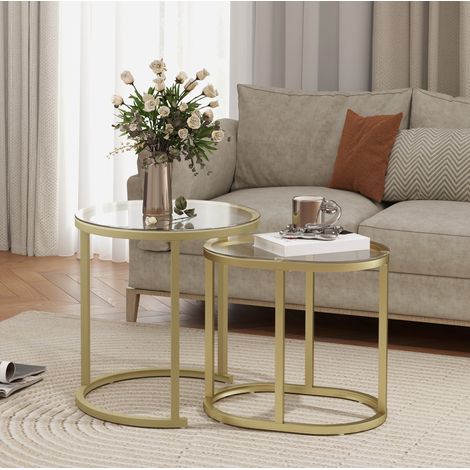 Set de 2 tables basses rondes et ovales en acier et verre trempé couleur or (1/5)