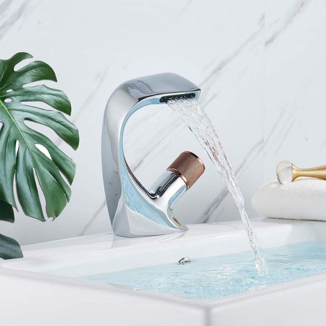 Chrome waterfall basin mixer, single hole installation.