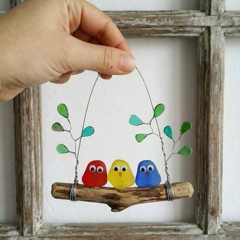 Der mehrfarbige Meeresglas-Vogelschnapper (drei Vögel, Meeresglas-Version) -