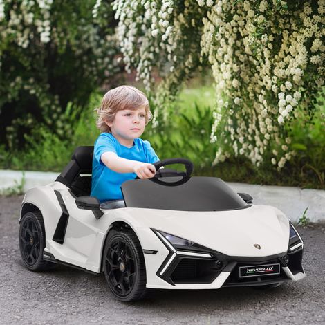 Coche eléctrico para niños de 3 a 5 años, 12 V, con licencia Lamborghini Revuelto, 3-5 km/h. Puertas de mariposa, 2 motores, suspensión, mando a distancia, música, ruedas, faros, color blanco.