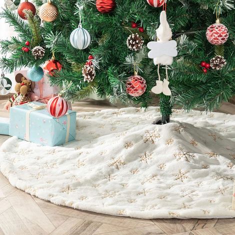 Jupe de sapin de Noël blanche en fausse fourrure blanche pour support de sapin. (1/5)
