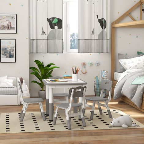 Set per bambini composto da 5 pezzi: tavolo e 4 sedie regolabili in altezza, colore grigio.