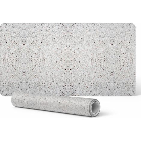Alfombrilla protectora de vinilo con un moderno estampado sim茅trico de terrazo de 90x45 cm.
