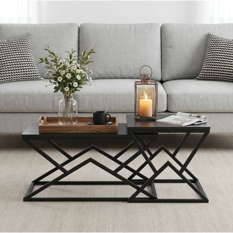 Table basse noire moderne géométrique avec plateau en panneaux de particules et structure métal, style industriel (1/5)