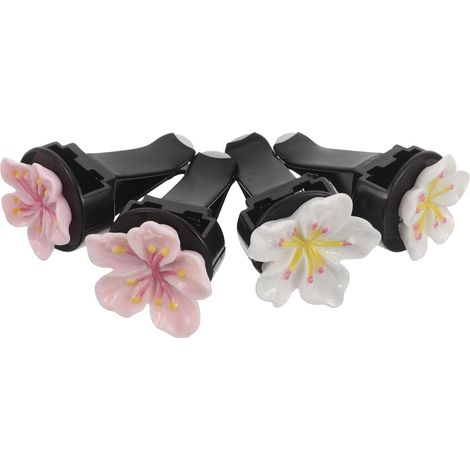 Lüftungsschlitzclips mit Licht und rosa Blüten