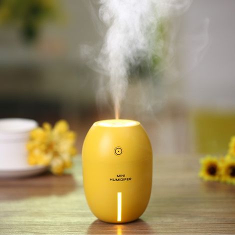 Trade Shop - MINI USB LUFTBEFEUCHTER AROMADIFFUSOR ULTRASCHALL AROMADIFFUSOR + 4 ESSENZEN - (1/2)