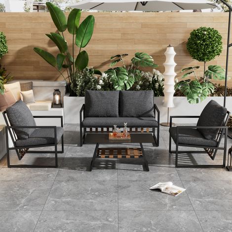Set di mobili da giardino in PVC nero, salottino per 4 persone con tavolino in vetro temperato, ripiano e cuscini lavabili