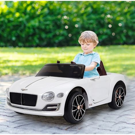 Coche eléctrico infantil 108x60x43 cm de metal blanco con mando, para jardín – MEUBLIV (1/5)