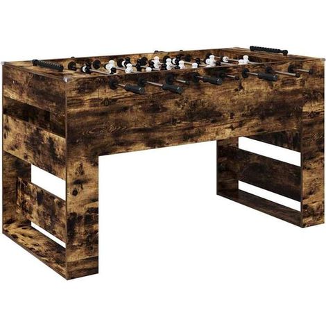 Un baby-foot sur une table en chêne fumé, 146,5 x 74 x 85 cm.