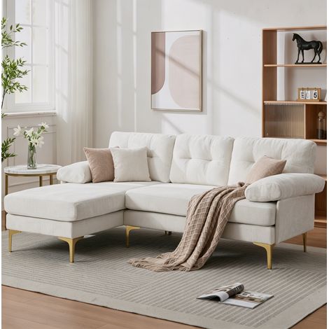 Divano angolare 187,5x130x79 cm beige in chenille e legno con seduta reversibile e braccioli imbottiti (1/5)