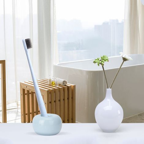 Porte-brosse à dents créatif en céramique en forme de donut avec une base de brosse à dents aux couleurs acidulées. (1/4)