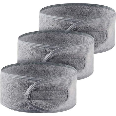 Schwarzes, gestreiftes Haarband für Gesichtsbehandlungen, Spa und Yoga – ein Beauty-Accessoire, das die Haare an Ort und Stelle hält. (1/5)