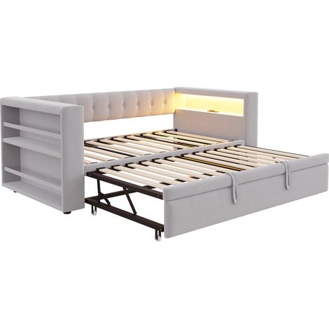 Cama multifunción 90/180 x 190 cm en tejido gris claro con LED, enchufes y almacenaje (1/5)