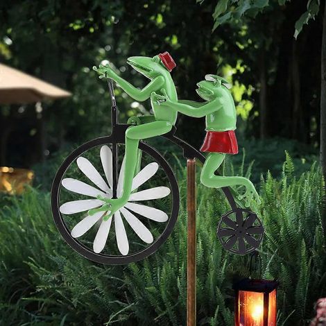 Girouette vintage en métal représentant un animal en forme de grenouille ou de moto, à planter dans un piquet pour décorer jardin ou pelouse. (1/4)