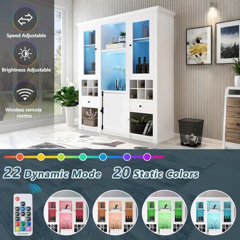 (=2967707172AAA) Vitrine avec 7 couleurs de lumières LED. Vitrine sur pied, dotée d’espace de rangement. Vitrine pour le salon. Vitrine en blanc avec LED. Vitrines LED pour les pièces à vivre. (1/5)