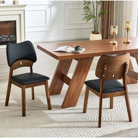 MEUBLIV Lote de 2 sillas de comedor negras con respaldo mariposa y asiento acolchado (1/5)