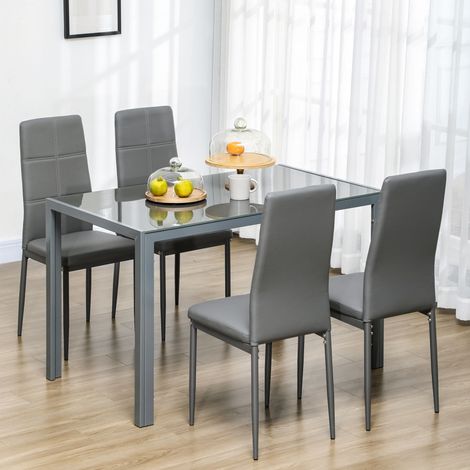 Ensemble table à manger avec 4 chaises. table de cuisine avec chaises en cuir synthétique. 120 x 70 x 75 cm. gris