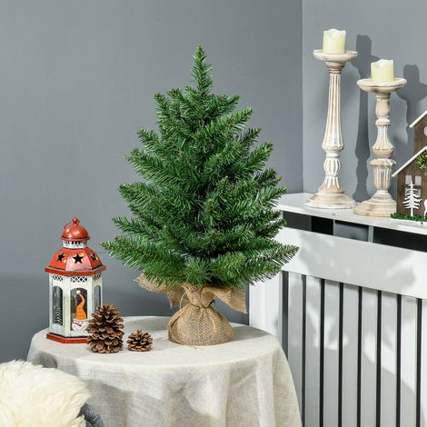55 cm großer Mini-Weihnachtsbaum mit 50 dicken Zweigen und realistischen PVC-Nadeln, Sockel aus Zement und Jute.