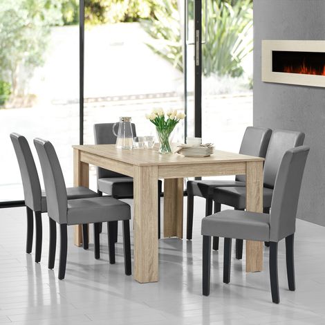 Set Pranzo con Tavolo 140x90 cm e 6 Sedie in Similpelle - Effetto (1/5)