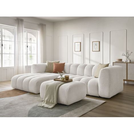 Bobochic – Canapé d'angle fixe 4 places en tissu bouclette – Longueur 288cm – Largeur 186cm – Design moderne – Avec pouf angle gauche blanc (1/5)