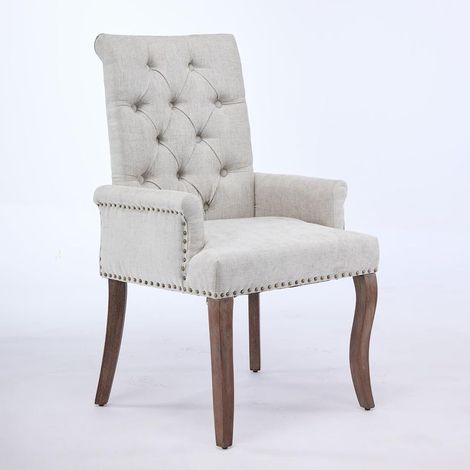 Chaises de salle à manger en tissu chenille beige, avec pieds incurvés en bois massif, accoudoirs et détails de boutons (1/5)