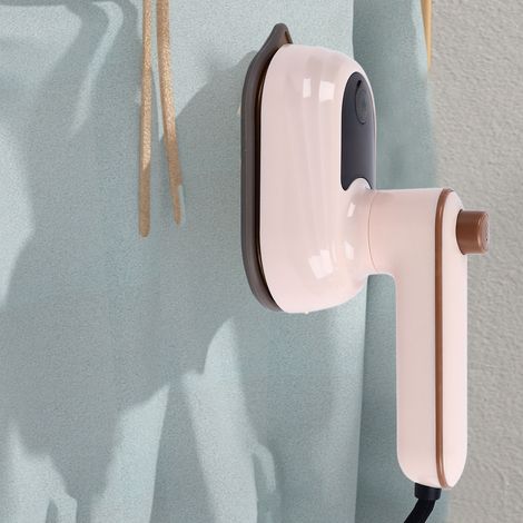Mini plancha de vapor eléctrica portátil con diseño plegable y giratorio. (1/5)