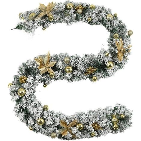 Une élégante couronne de pin, ornée de touches d'or et d'argent, constitue décoration de Noël mesurant 2,7 mètres de long. (1/2)