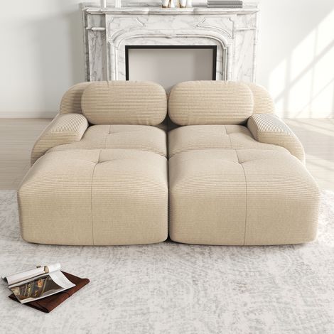 Divano angolare modulare in velluto a coste beige, senza struttura, con braccioli ergonomici e base antiscivolo (1/5)