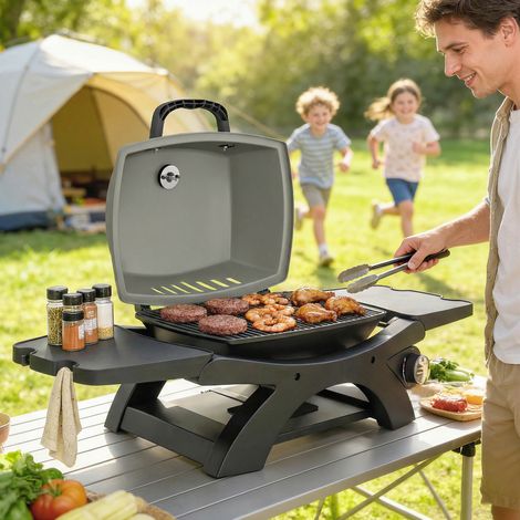 Barbecue a gas da tavolo da 3,3 kW con 1 bruciatore, pieghevole, con ripiani laterali, griglie in ghisa e vassoio raccogli-grasso rimovibile.