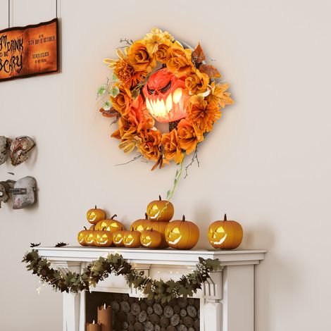 Ghirlanda di Halloween, design spettrale con zucche, foglie autunnali, effetti di luce, plastica