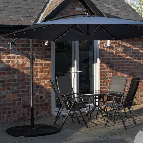 Outdoor 4 Person Round Glass Top Garden Dining Table Chairs With Blue Banana Lit Parasol and Base Set (1/5)