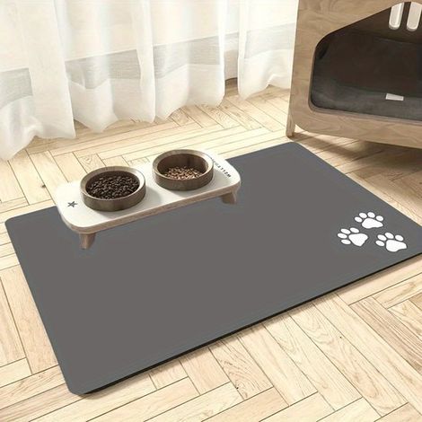 Tapis d'alimentation pour animaux 30 x 40 cm, gris à motifs de pattes blanches, tapis en silicone imperméable pour chiens et chats, sous-tapis pour gamelles (1/2)