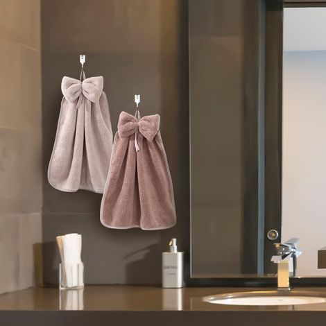 Ensemble de 4 serviettes avec nœud et boucles de suspension, en polaire microfibre corail. (1/3)