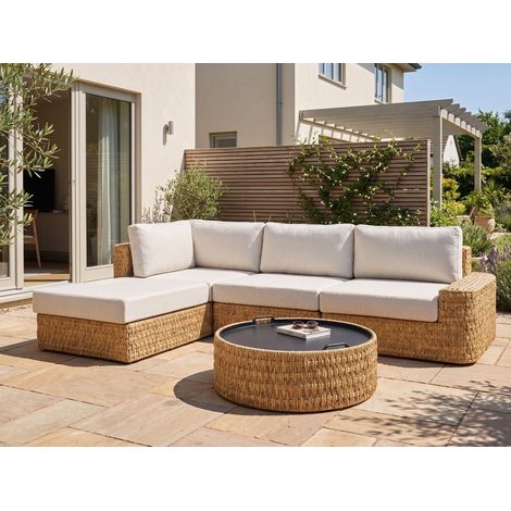 Conjunto de jardín sofá de 4 plazas de ratán sintético derecho mesa de centro con tablero de bandeja cojines beige Oliveri (1/5)