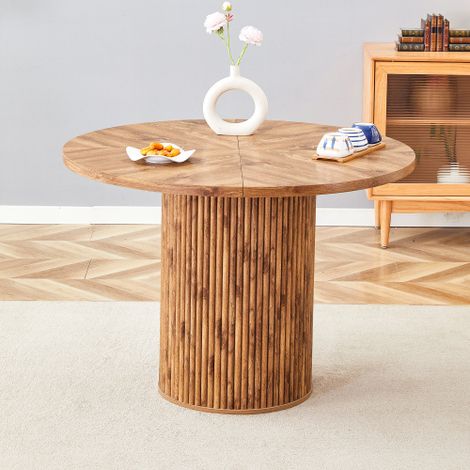 Une table de salle à manger ronde en MDF (100 cm) pouvant accueillir 4 à 6 personnes, dotée d'un pied cylindrique renforcé intérieurement par des tiges métalliques et fixé par Velcro — un choix idéal  (1/5)