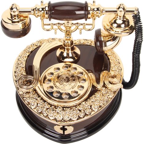 Boîte à musique rétro, luxe discret, objet de décoration innovant et élégant en forme de cœur, inspiré des téléphones anciens. (1/5)