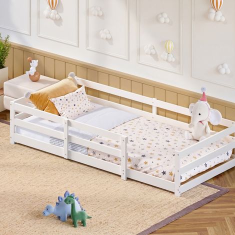 Letto Montessori per bambini in legno massello di pino bianco 90x200 cm con testiera bassa, sponde di protezione e rete a doghe