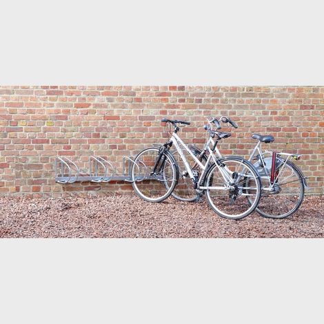 Mottez – Ratelier 4 vélos mural B141V4 – Angle 45° – Acier zingué traité anti-rouille – Entraxe 50 mm pour rangement facile (1/2)