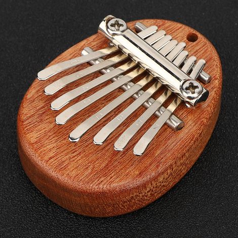 Piano de Poche 8 Touches en Acrylique Transparent Miniature Instrument Musical Cadeau Déco Portable (1/5)