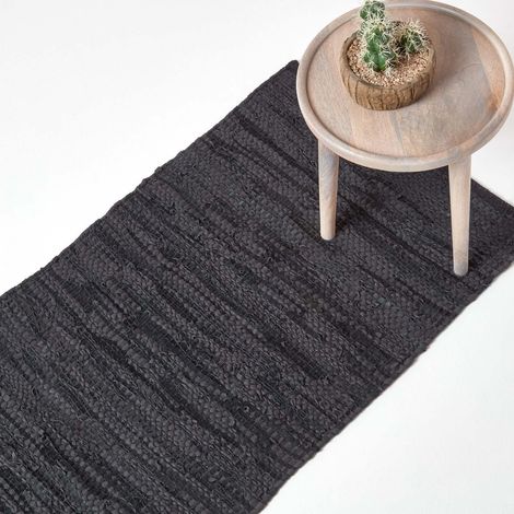 HOMESCAPES Schwarzer Leder-Webteppich Denver, 66 x 200 cm